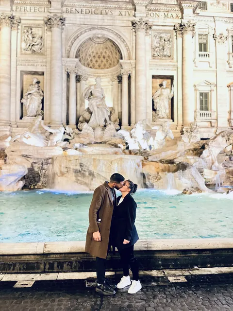 Julia and Nouh at the Trevi Fountain