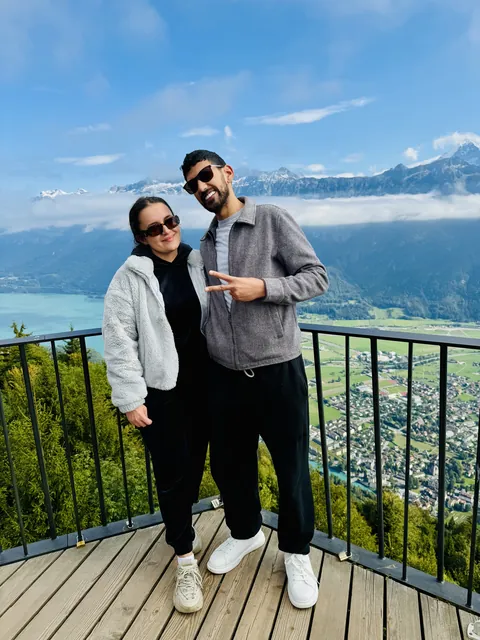Julia and Nouh at a mountain viewpoint