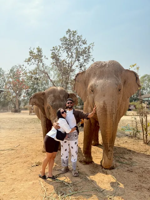 Julia and Nouh beside elephants