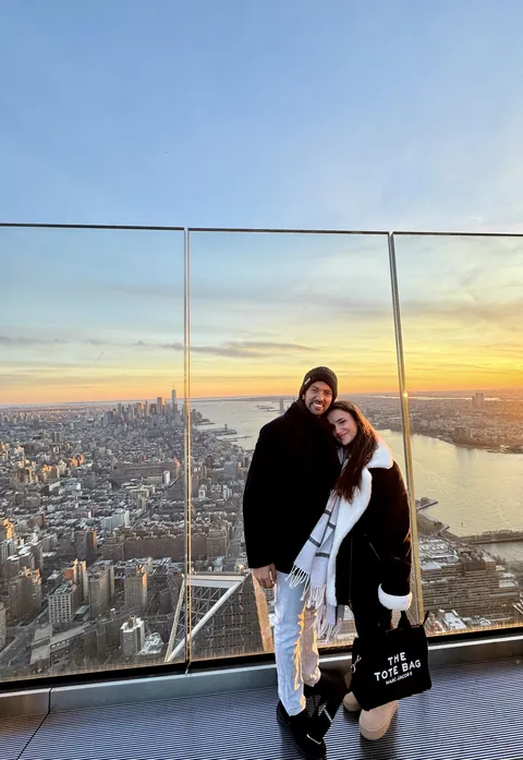 Julia and Nouh above the city skyline